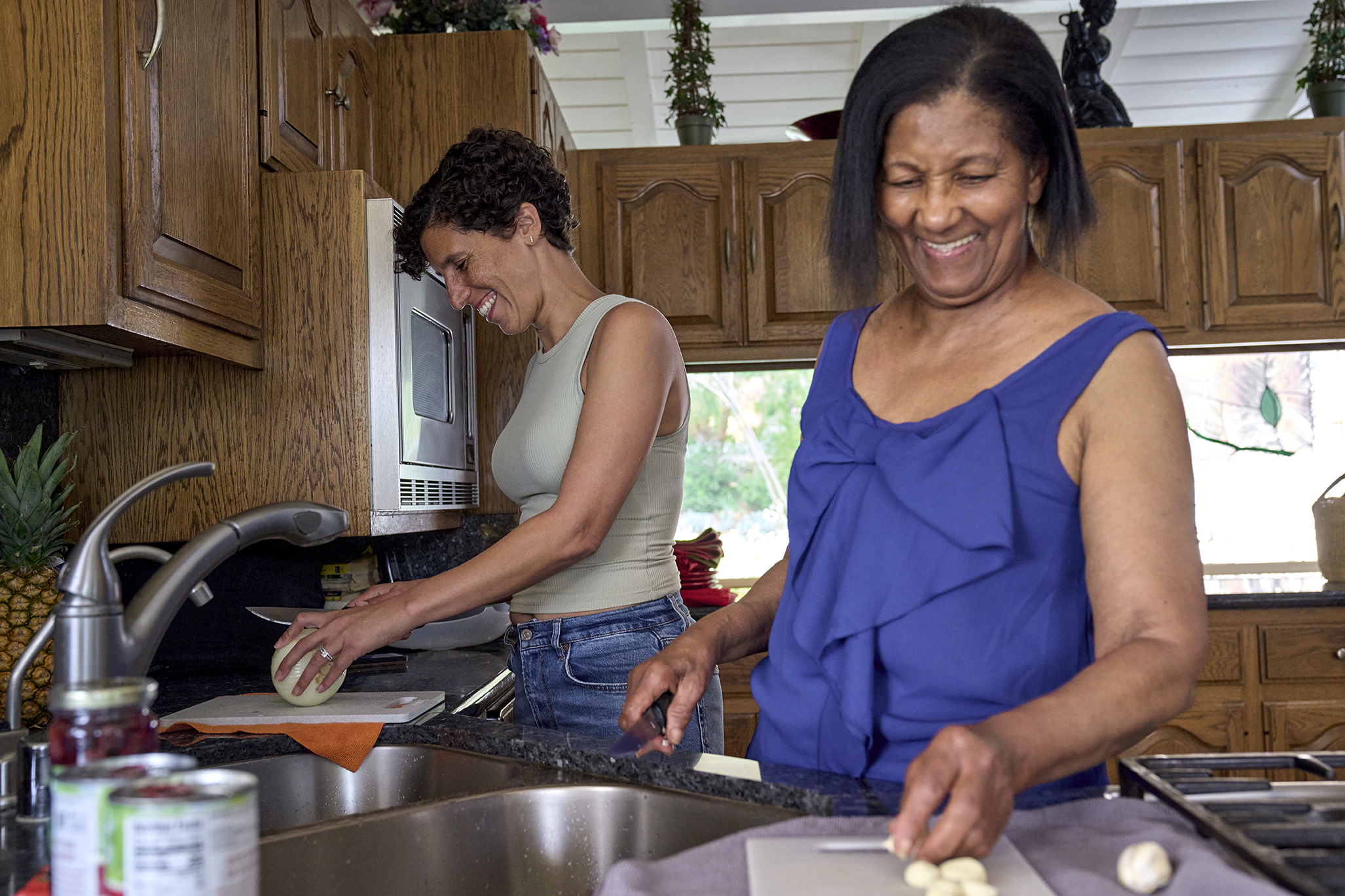 women cooking and smiling